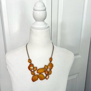 Faceted geometric orange bib statement necklace